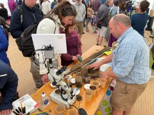 Professor Brian Reid analysing soil samples with members of the public.