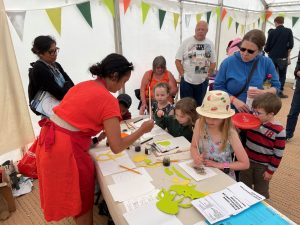 Kasia working with a group of children at the Wild About Kirkley workshop.