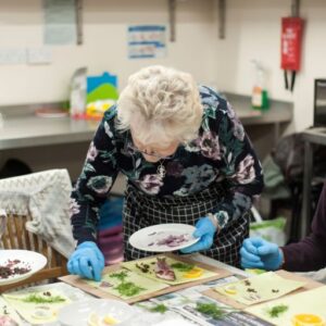 Participant making a picture using plants