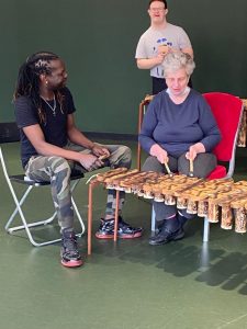 Zimbabwean Musician Nqoble Khoza with Brave Art Student Jenny Gardiner