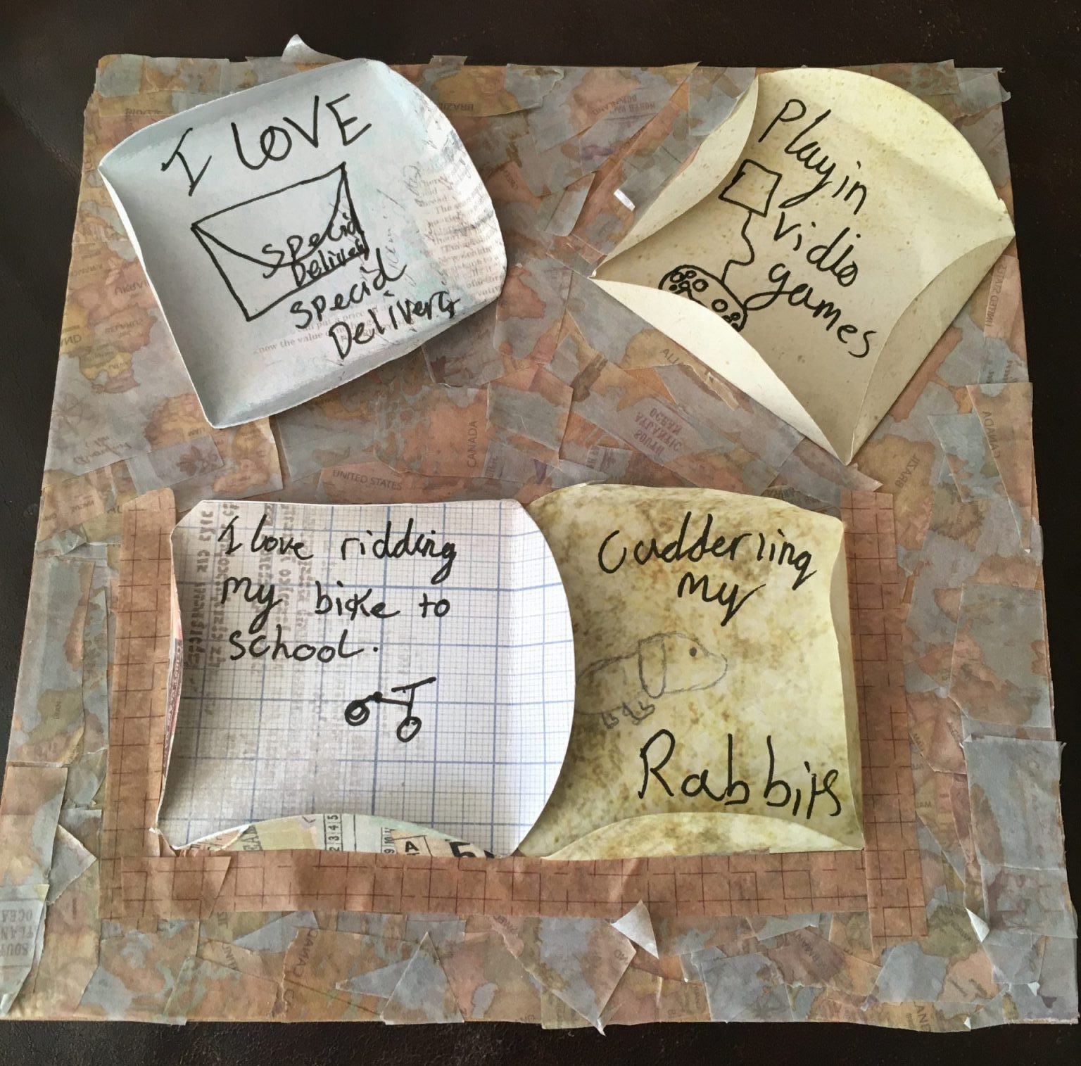 A handmade card with phrases saying I love special delivery and cuddling my rabbits