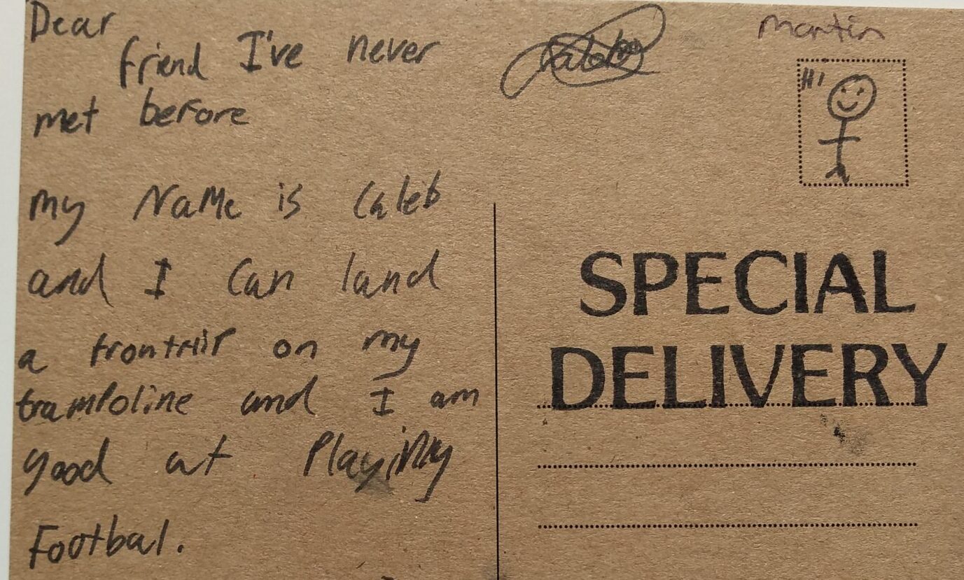 A hand written special delivery postcard