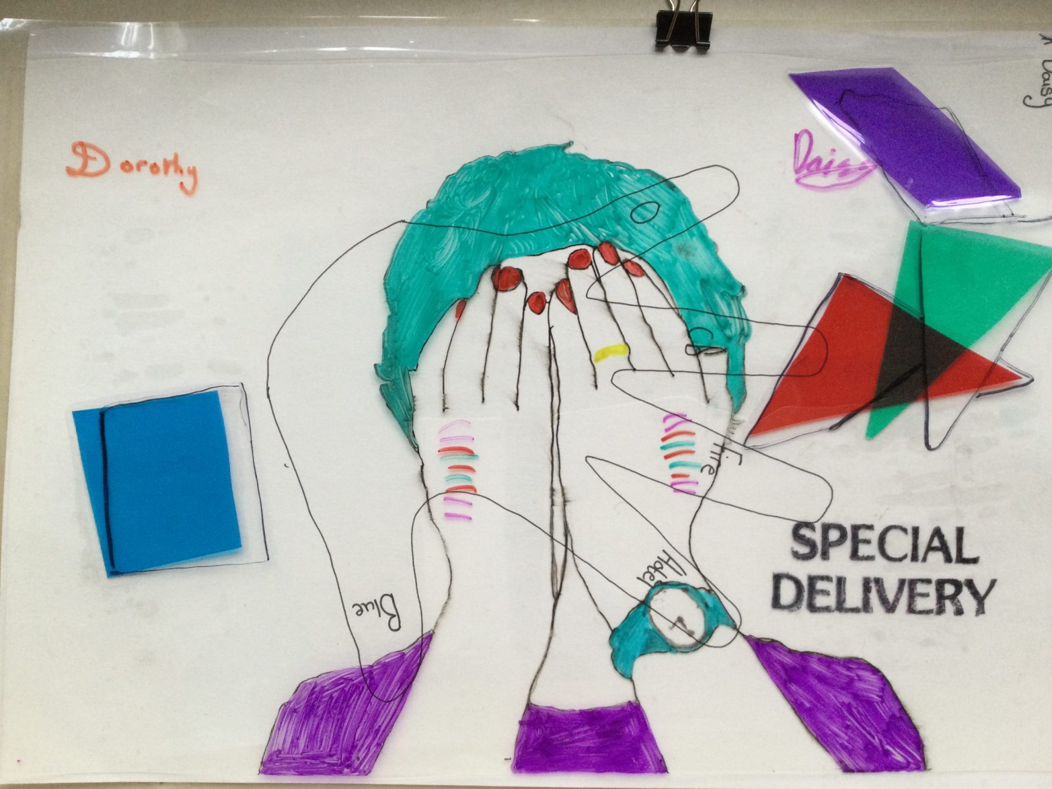 A colourful picture of a face, drawn on acetate