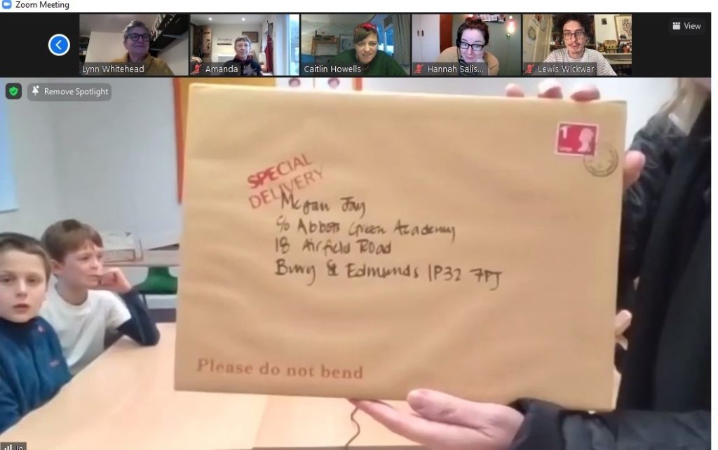 An A4 envelope with the words Please do not bend printed in red, addressed to the school