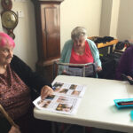 Beech House residents reading the children's recommendations