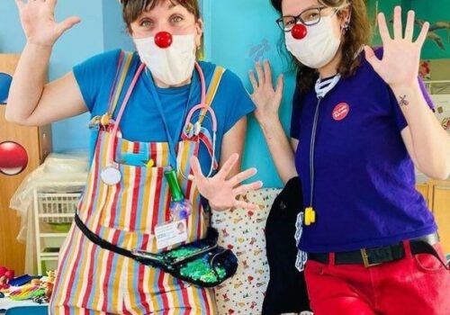 2 waving clown doctors