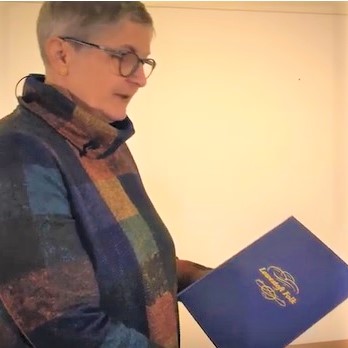 Lynn Whithead holding the Lowestoft Folk book