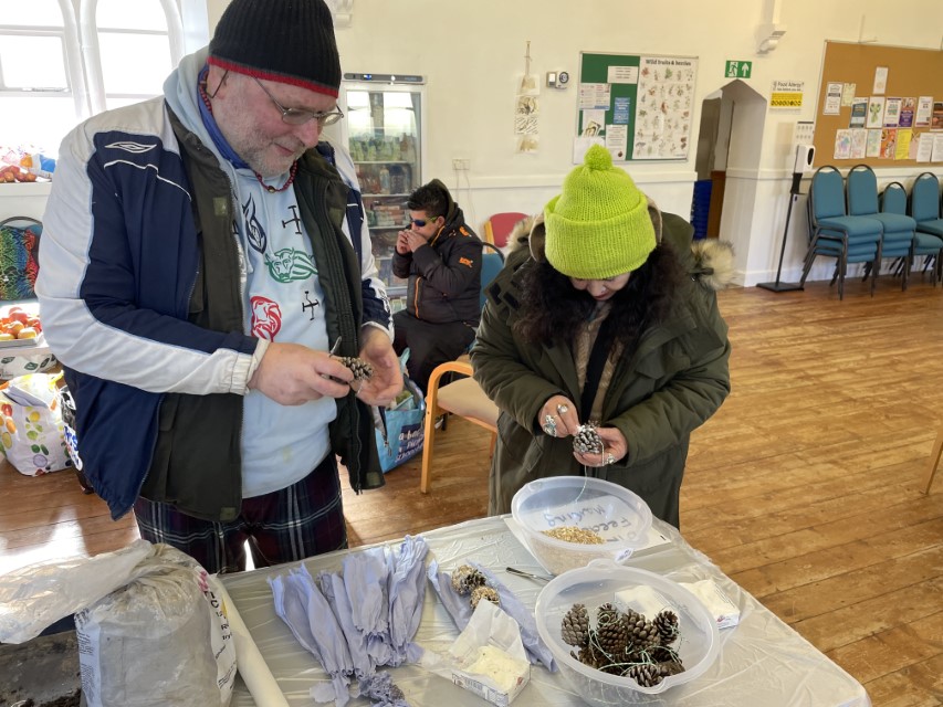 Wild About Kirkley participants working with pine cones