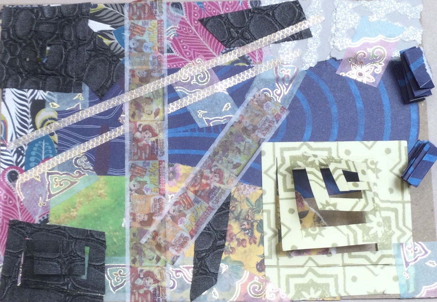 A collaged postcard covered in snippets of paper, overlaid with thin white and gold tape, thicker cartoon tape and cut-out patterns in which the paper rises up from the surface of the card