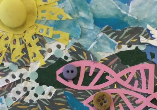 A collaged postcard with a background of numerous small pieces of blue and gold patterned papers with a large yellow sun in the lefthand corner, a tiny white bird and pearl to the right and two pink fish with button eyes below