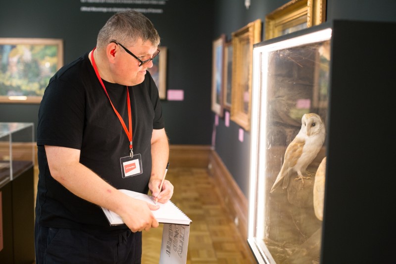 Brave Art student viewing Christchurch Mansion's collection