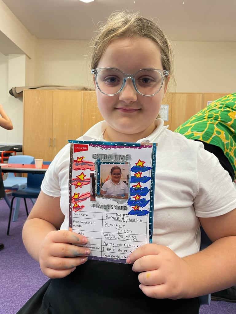 A school pupil sharing her player's card on which she has listed making her cousin smile and being helpful as some of her skills