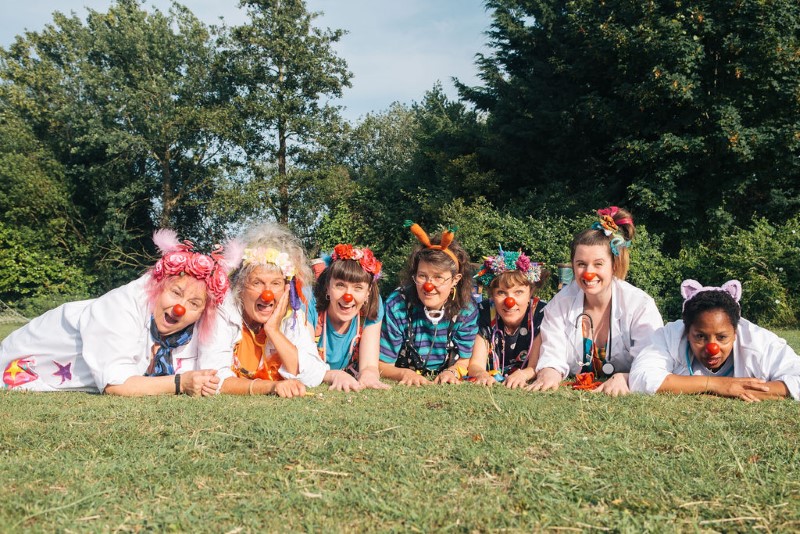 A group photo of six clowns