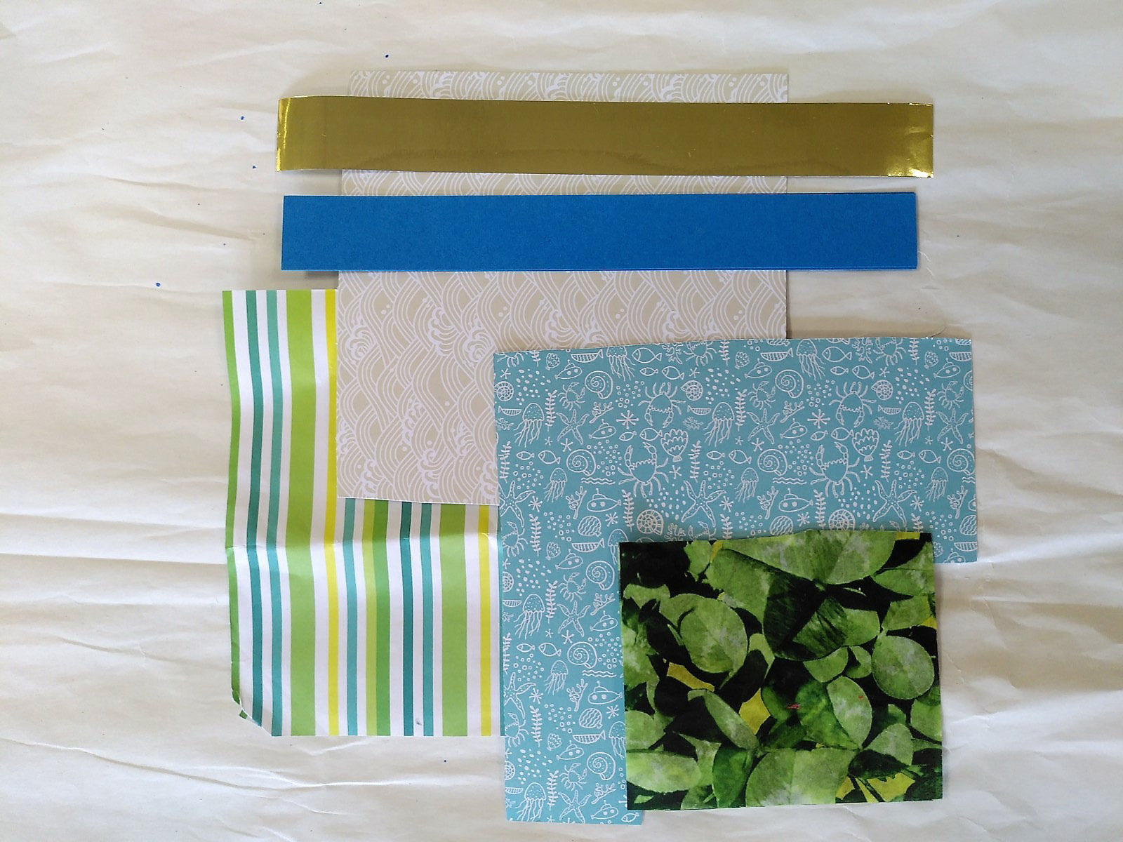 Mood board of blues, greens and whites