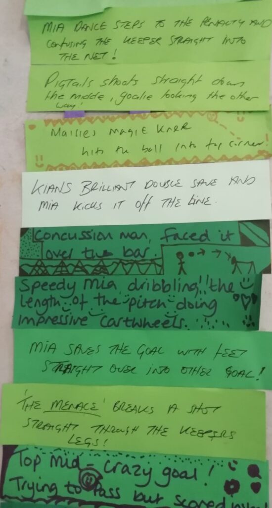A series of strips of green paper stuck together, each strip with a hand written line of verse on it referencing football