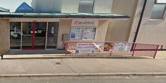 Entrance to St Andrew's Church including step free access and automatic door.