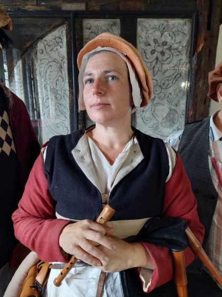A woman in Tudor costume