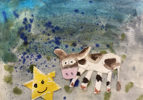 Cut outs of a cow and a smiling sun used for animation against a blue wash background.
