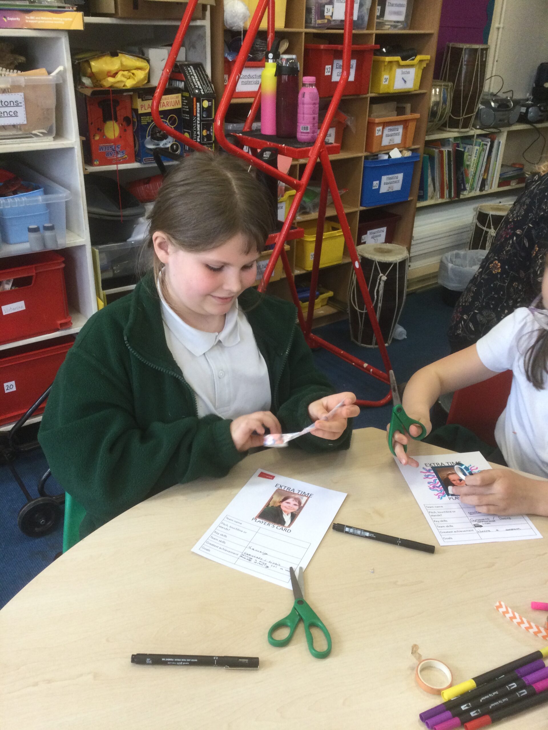 School children decorated cards with photos and coloured pens