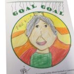 GOAL GOAL a picture of Ethel Brown wearing a green jersey and with gold, orange and yellow bands either side