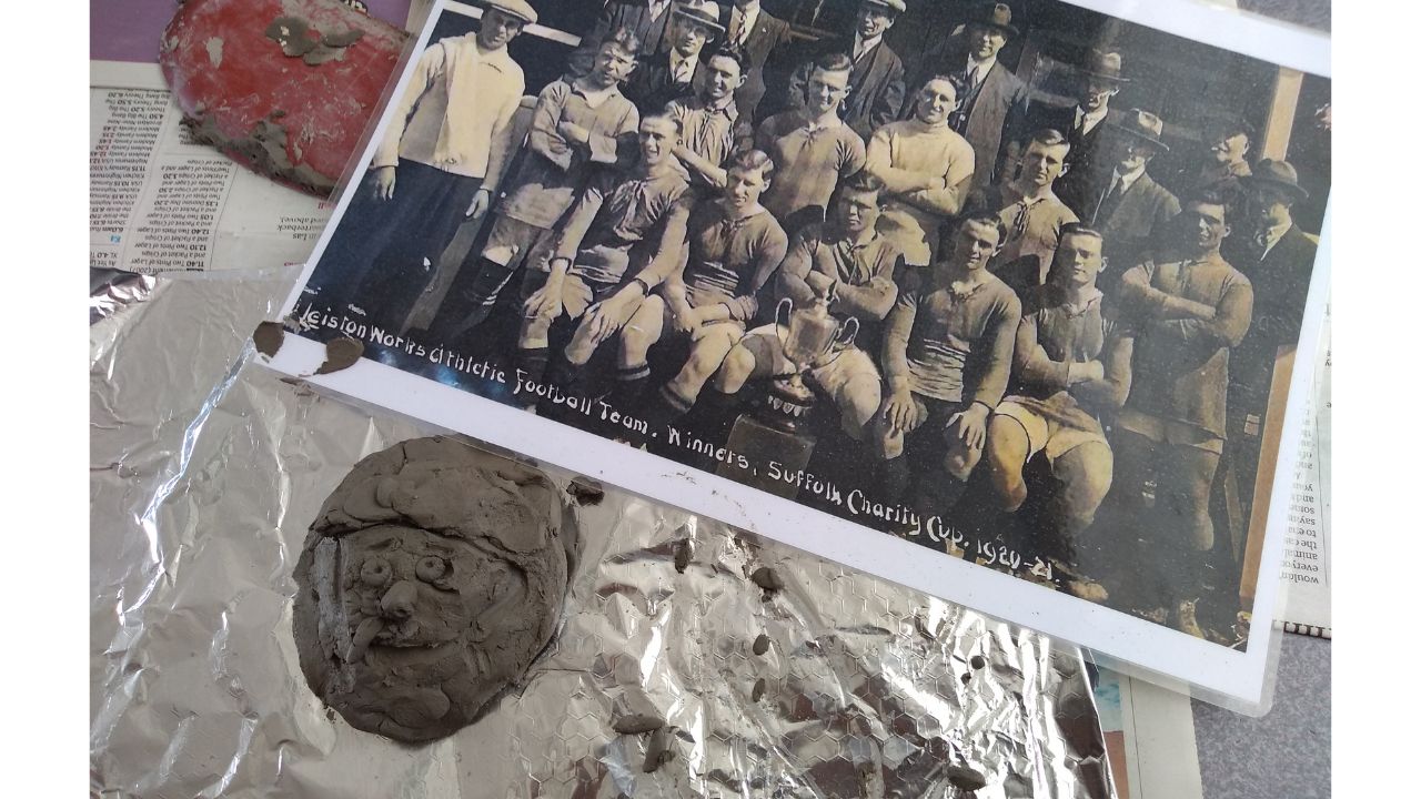 Photo of Leiston Works Athletic Football Team Winner Suffolk Charity Cup 1920-21 and a clay disc portraying one of the team