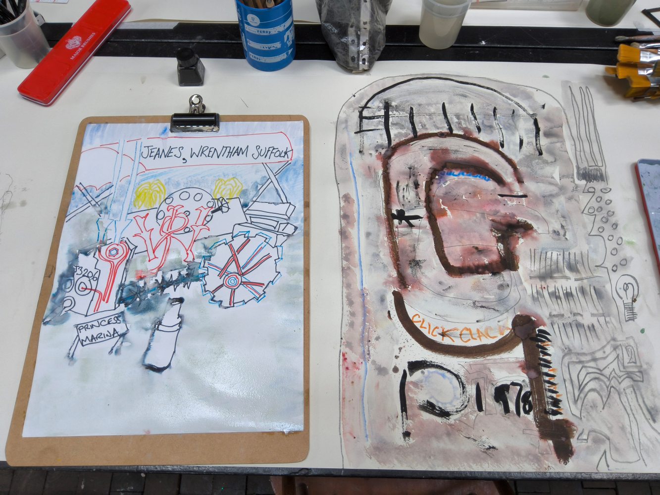 Two watercolour pictures on a table top, Jeanes, Wrentham Stores using details sketched in the Long Shop and the clamp in brown inks and paint