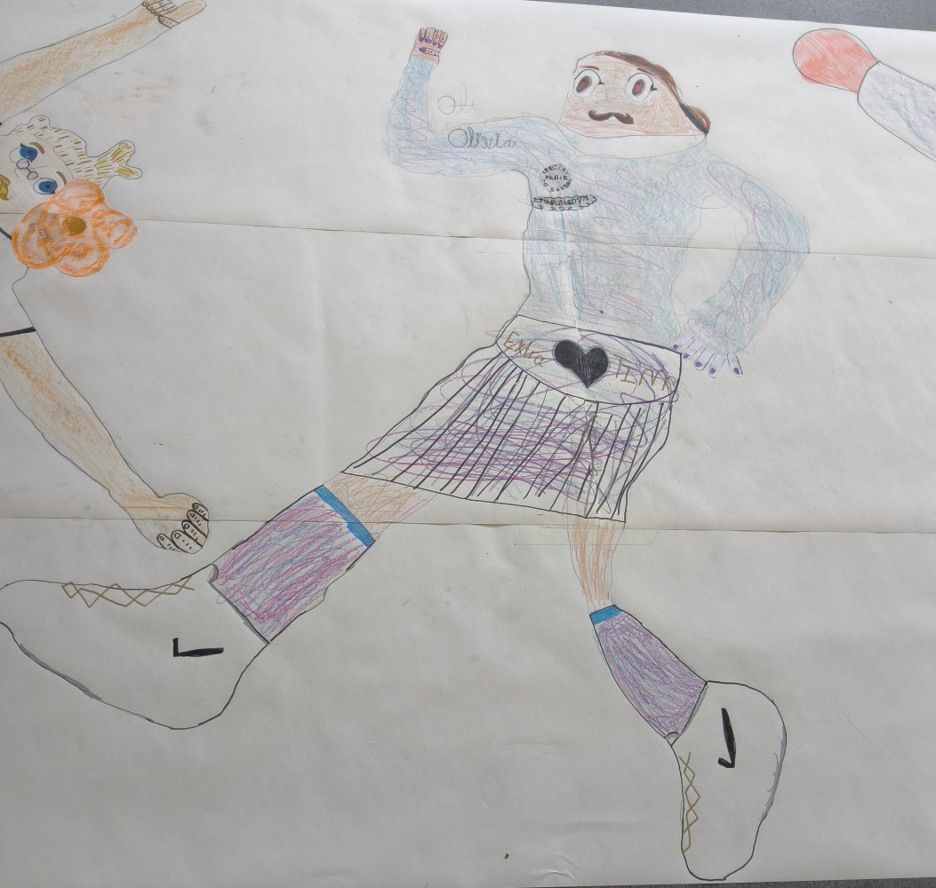 A colourful drawing of a football player with an Extra Time belt and stripey skirt