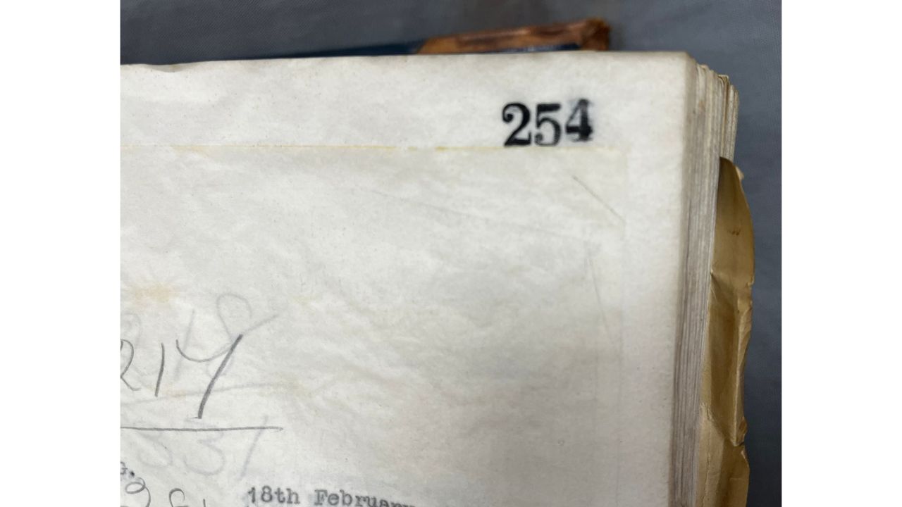 254 - a stencilled page number