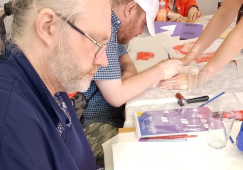 Participants taking part in a visual art workshop