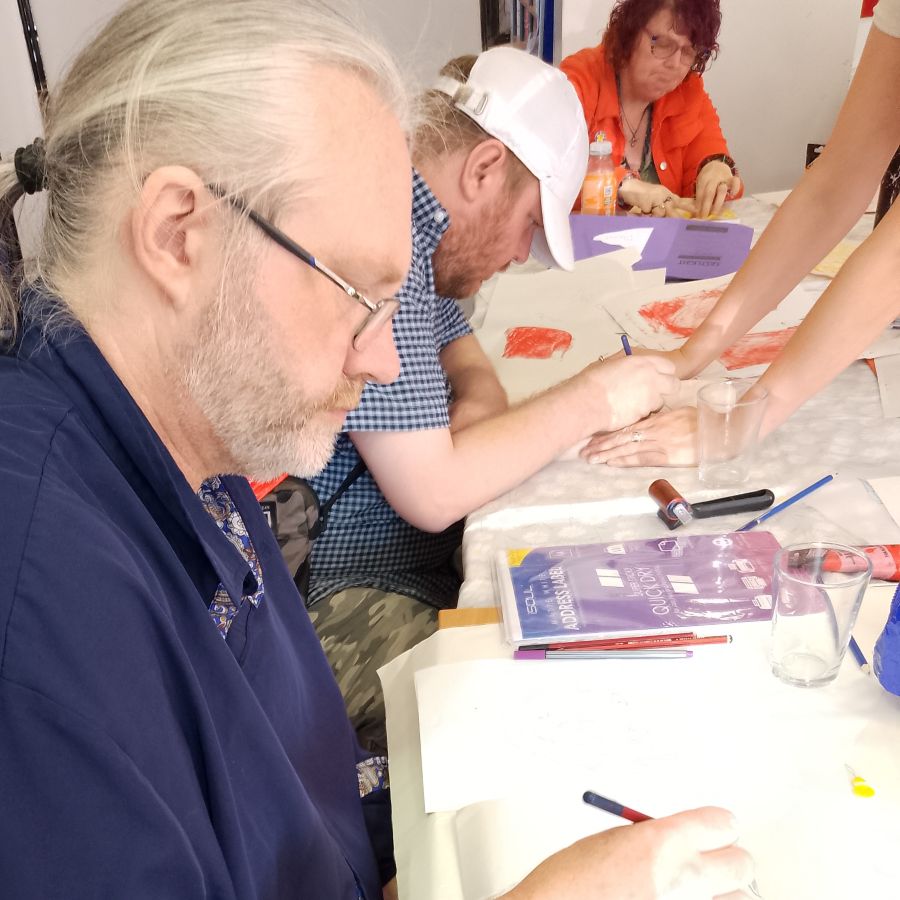 Participants taking part in a visual art workshop