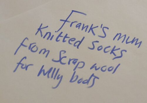 Frank's mum knitted socks from scrap wool for welly boots