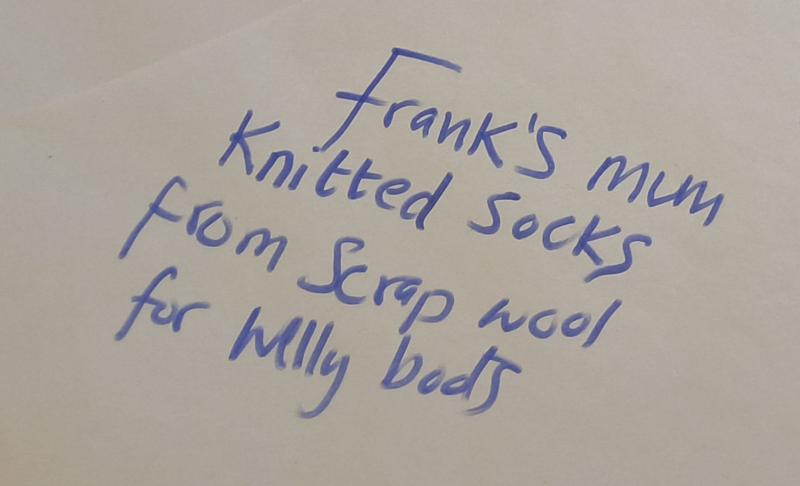 Frank's mum knitted socks from scrap wool for welly boots
