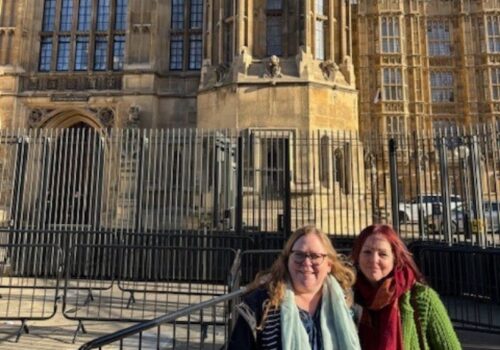 Jen Johnson and Lucy Chandler in front of the House of Lords.