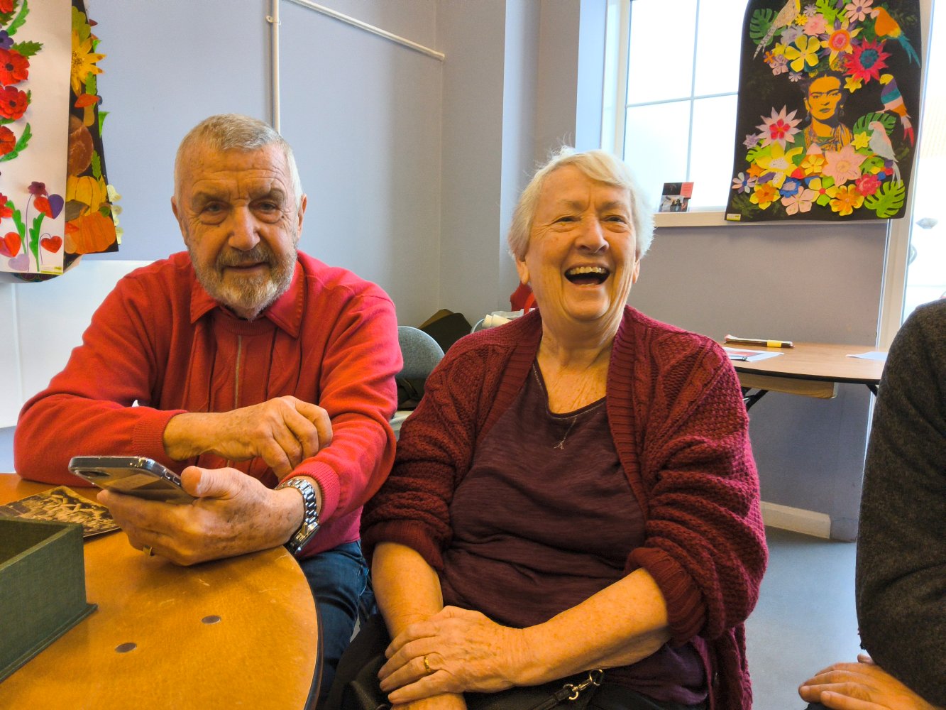 A couple having a good old laugh about something