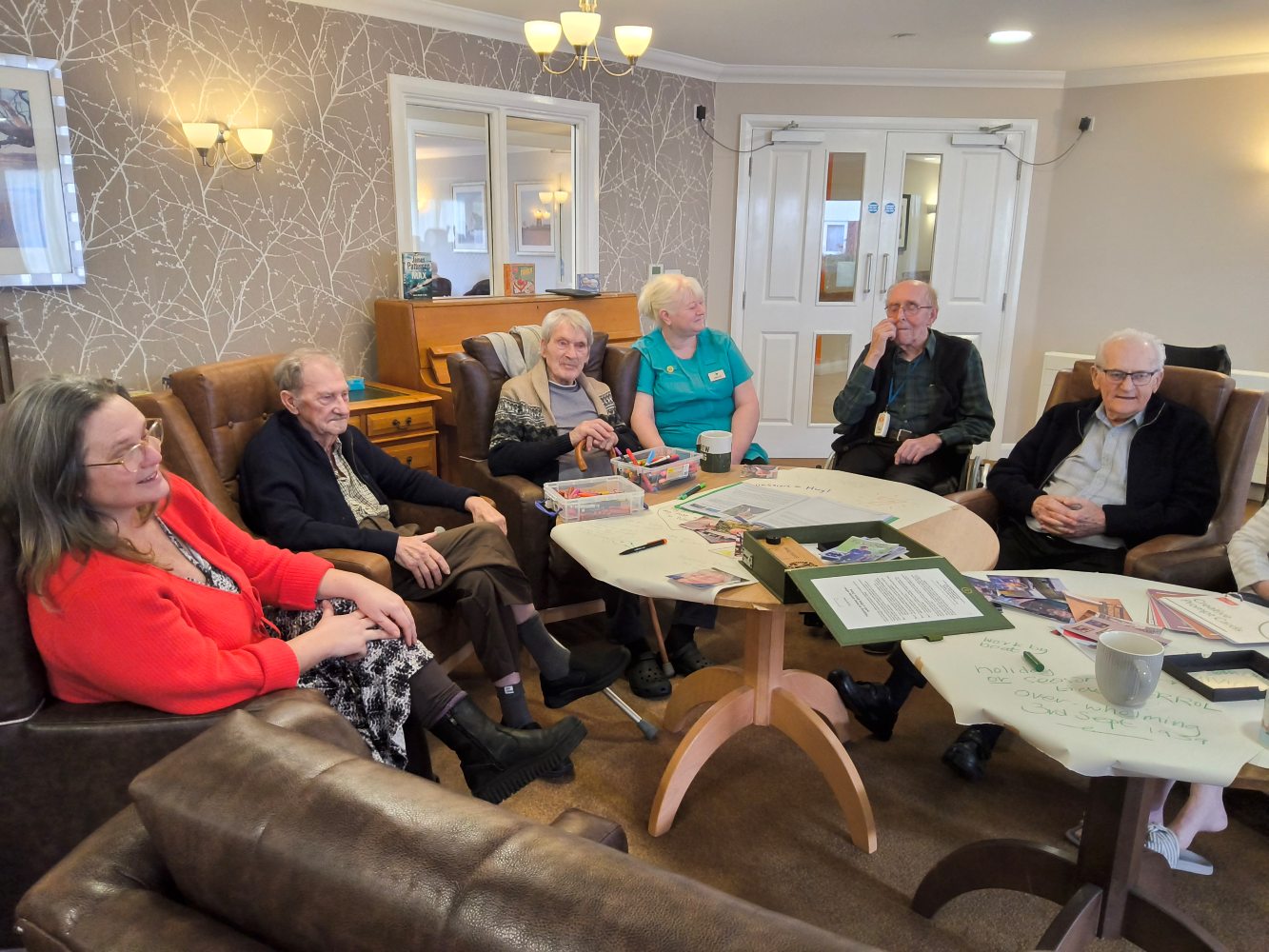 A group photo of men and women seated together