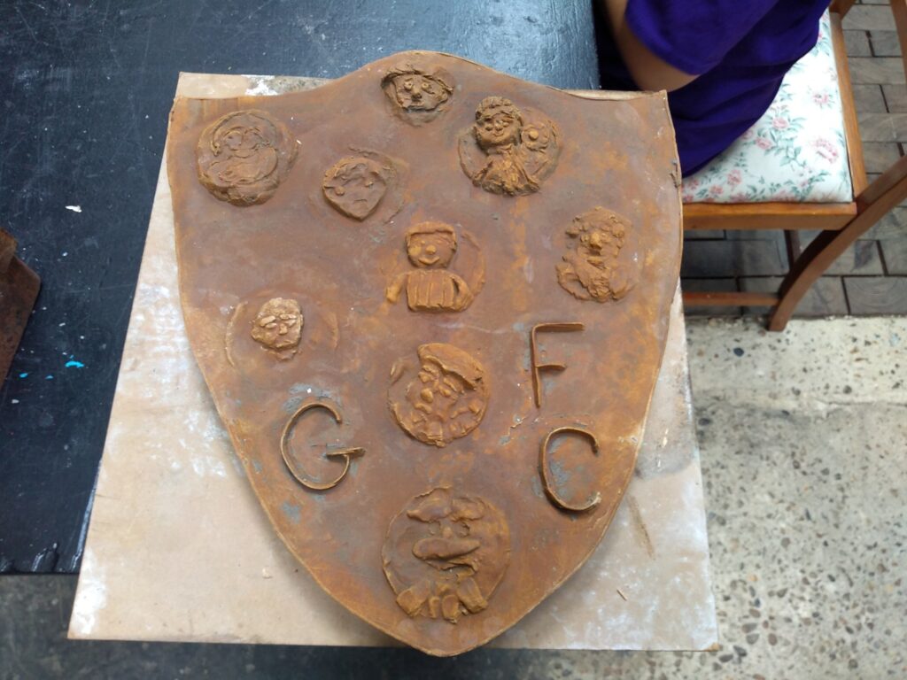 Dried plaster cast of shield