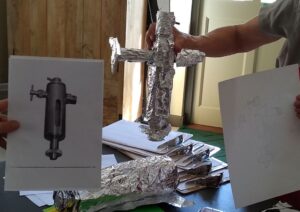 Foil recreation next to image of machine part