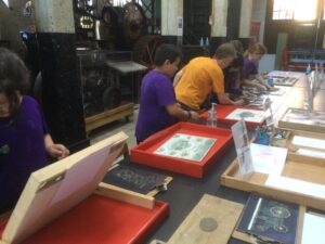 Pupils taking a few minutes to try out some of the Museum games