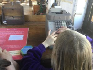 Pupils found it incredible that machines such as this adding machine were used for adding up