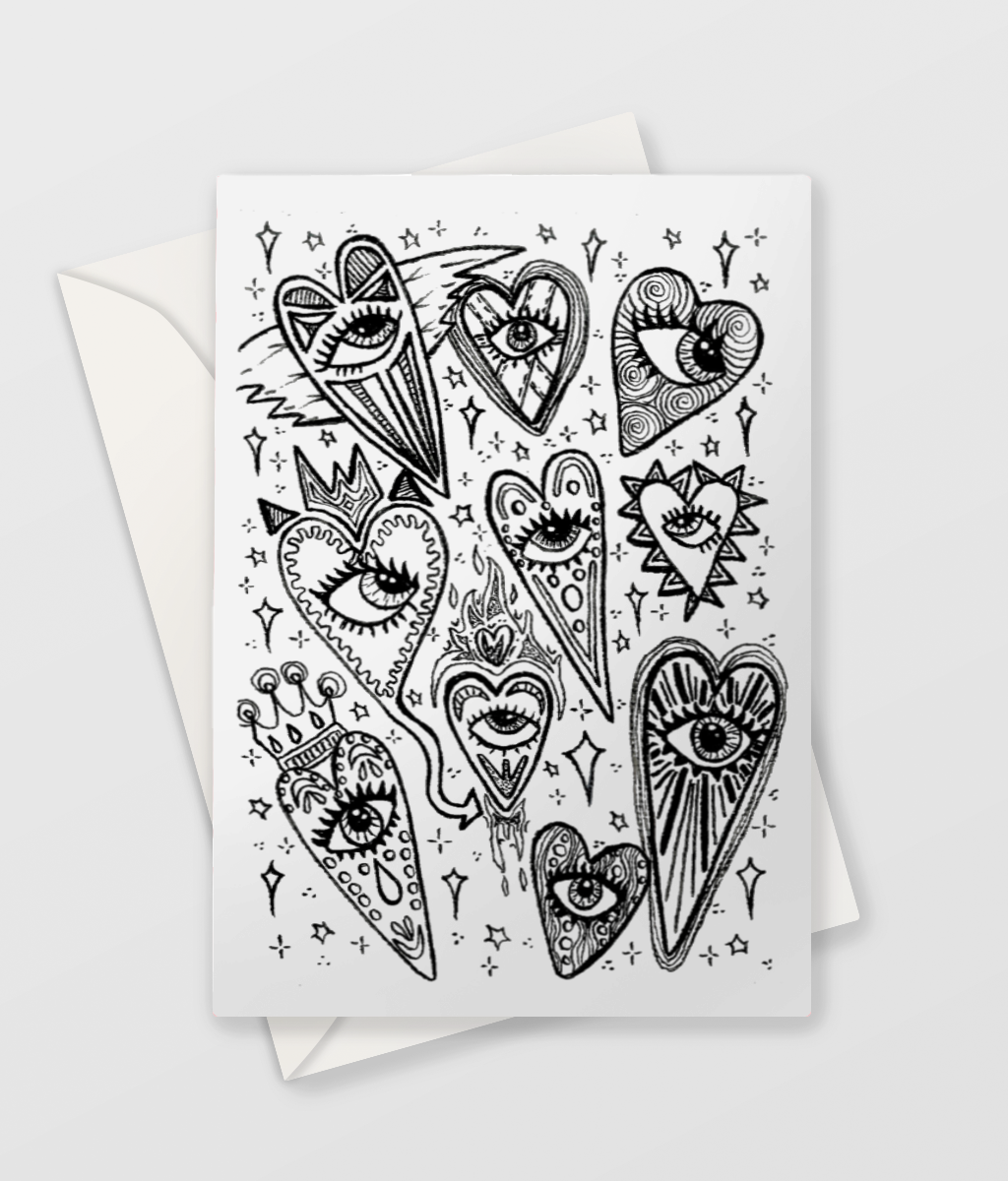 A design in black pen on white matt greetings card suitable for colouring.