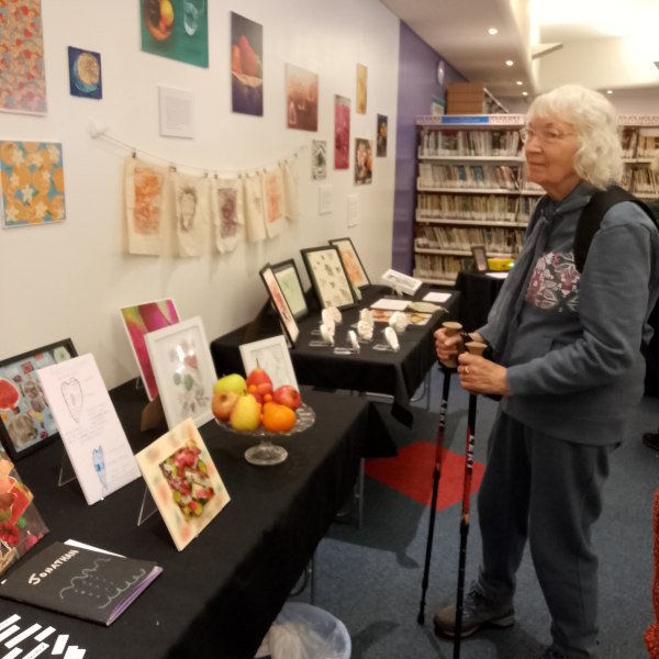 artist at an exhibiton