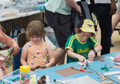2 kids taking part in activity at First Light Festival