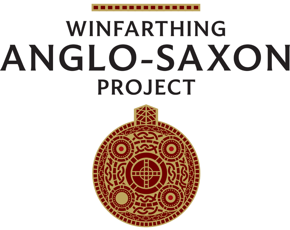Gold pendant inlaid with garnets
