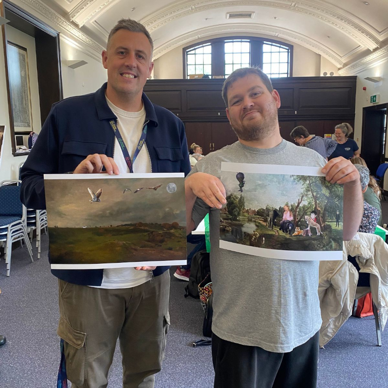 Guy and Will holding up copies of Will’s digital collages.