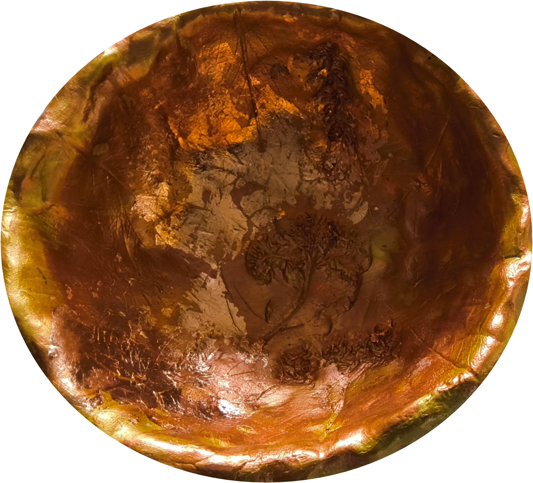 A large clay bowl decorated in gold leaf